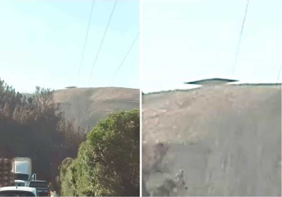 This Man Stopped Traffic After He Noticed Something Big Suddenly Land On Top Of This Mountain