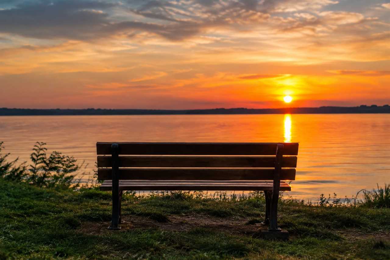 Empty bench at sunset, a moment of quiet reflection